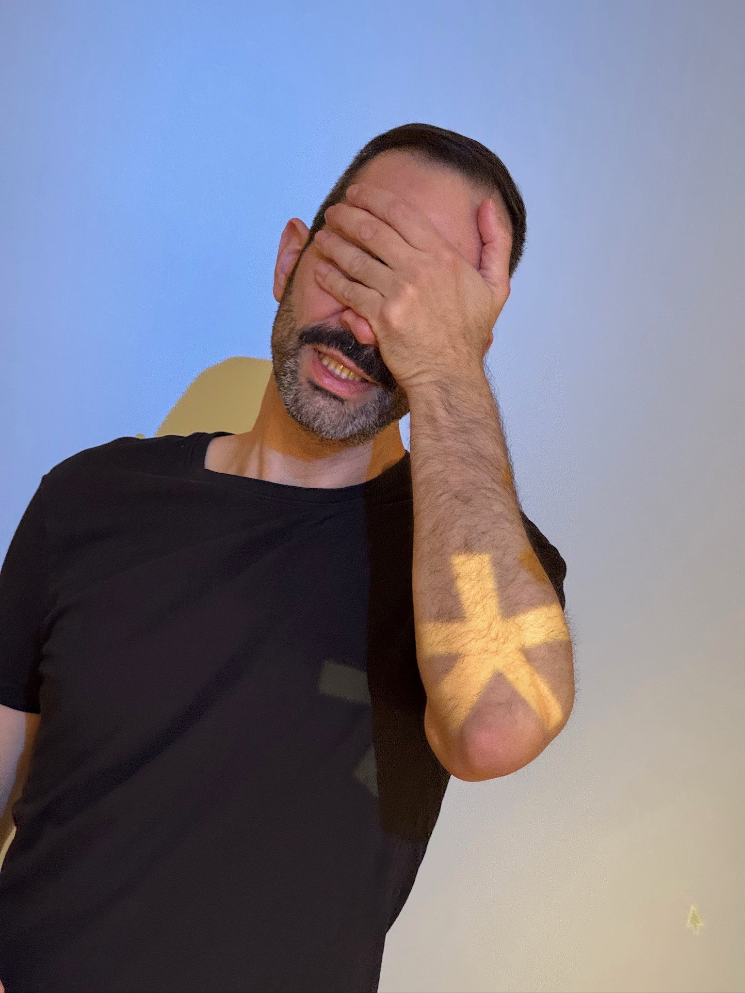 An avatar of a man with a beard.