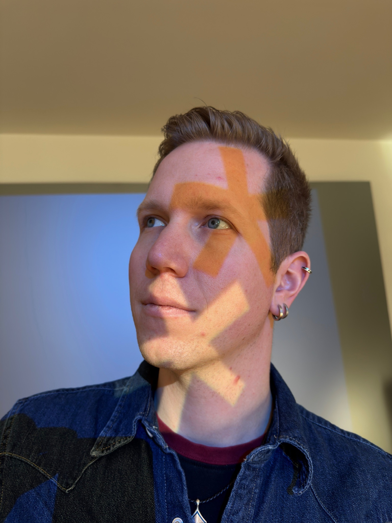 An avatar of a blond man.